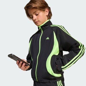 ADIDAS ORIGINALS Between-season jacket 'Teamgeist' in Black