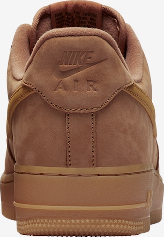 Nike Sportswear Platform trainers in Brown