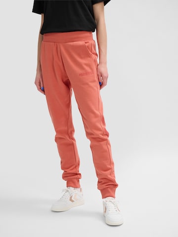 Hummel Tapered Workout Pants in Orange: front