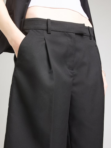 Monki Loose fit Pleat-front trousers in Black