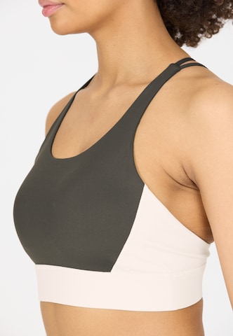 Athlecia Low Support Sports bra 'Aspasia' in Brown