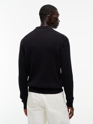 TOMMY HILFIGER Sweater in Black