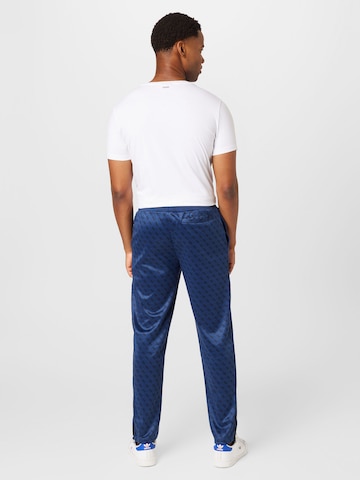 Slimfit Pantaloni 'Korbin' di GUESS in blu