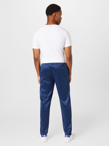 GUESS Slim fit Pants 'Korbin' in Blue