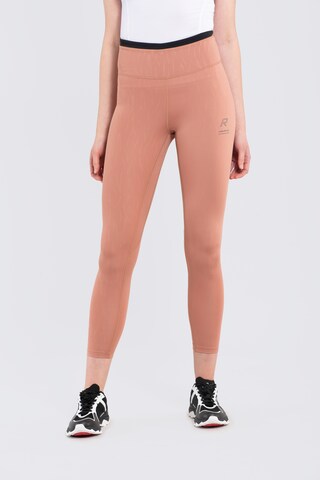 Skinny Pantalon de sport Rukka en orange : devant