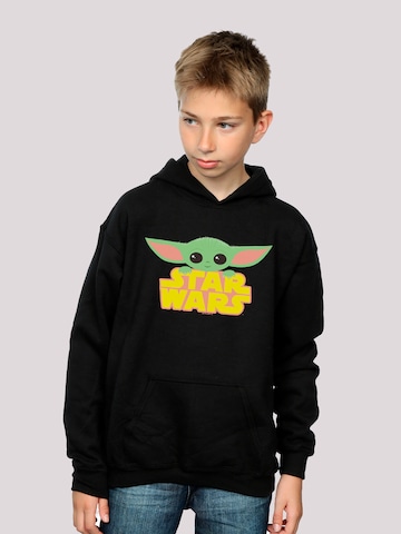 F4NT4STIC Sweater 'Star Wars The Mandalorian Yoda Star Wars Logo' in Black: front
