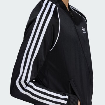 ADIDAS ORIGINALS Sweatjacka 'Adicolor' i svart