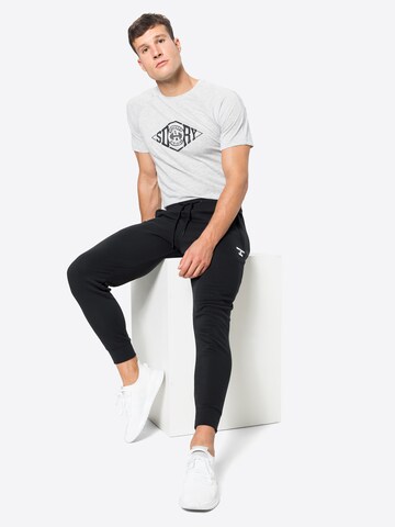 Superdry Ozke Športne hlače | črna barva