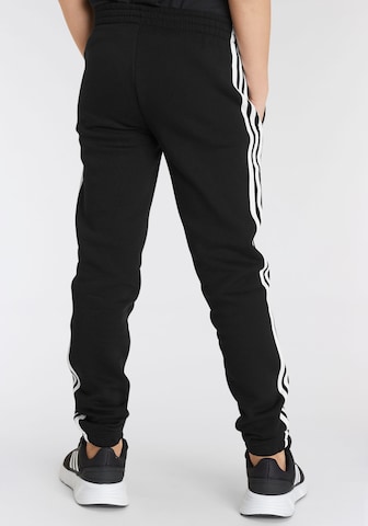 ADIDAS SPORTSWEAR Дънки Tapered Leg Спортен панталон 'Essentials' в черно