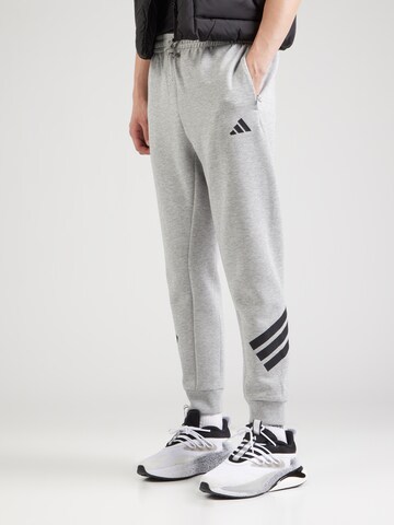 pilka ADIDAS SPORTSWEAR Siaurėjantis Sportinės kelnės 'Future Icons': priekis