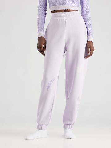 florence by mills exclusive for ABOUT YOU Tapered Pants 'Lili' in Purple: front