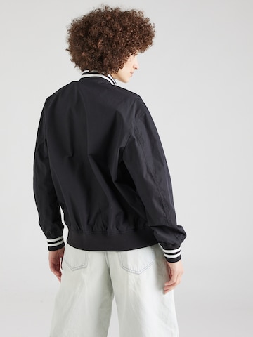 Champion Authentic Athletic Apparel Between-season jacket in Black