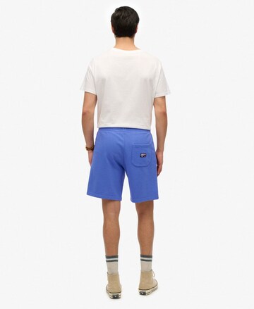 Superdry Regular Trousers 'Essential' in Blue