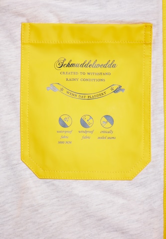 Manteau fonctionnel Schmuddelwedda en jaune