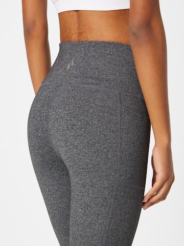 Skinny Pantalon de sport SKECHERS en gris