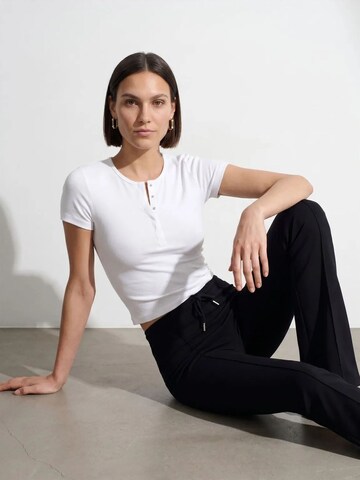 Camicia da donna di Dilvin in bianco