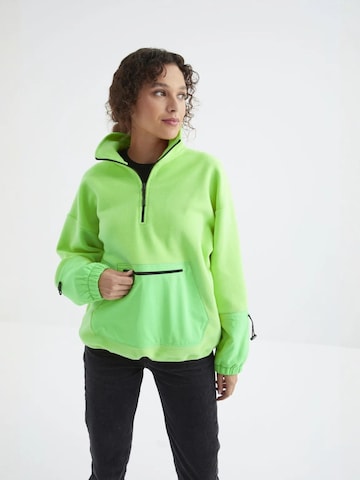 Sweat-shirt Tommy Life en vert
