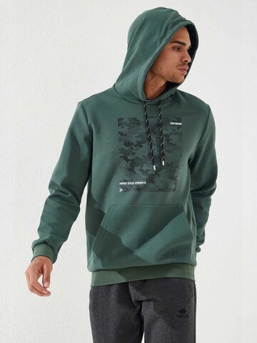Sweat-shirt Tommy Life en vert