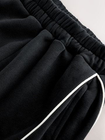 Wide leg Pantaloni sport de la Next pe negru