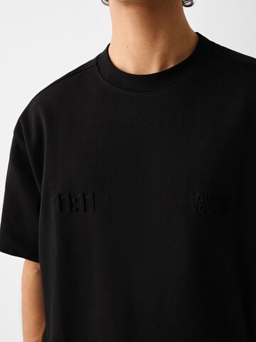 T-Shirt Bershka en noir