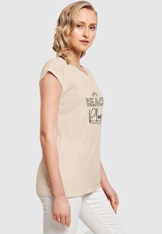 T-shirt 'Beach Please' Merchcode en beige
