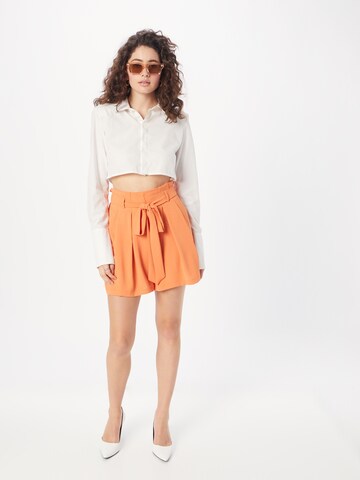 ABOUT YOU Wide leg Pleat-Front Pants 'Lia' in Orange