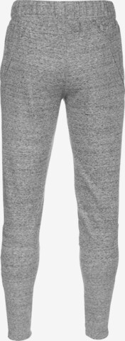 UNDER ARMOUR Regular Workout Pants in Grey