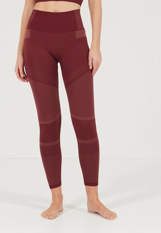 Athlecia Skinny Workout Pants 'SEMARAN SEAMLESS' in Red: front