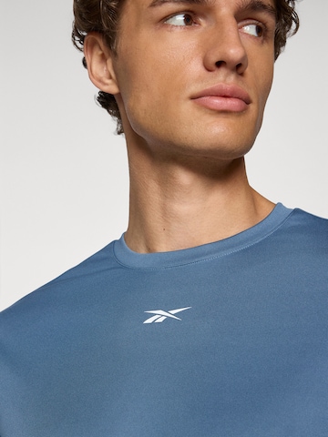 Tricou funcțional 'ID TRAIN' de la Reebok pe albastru