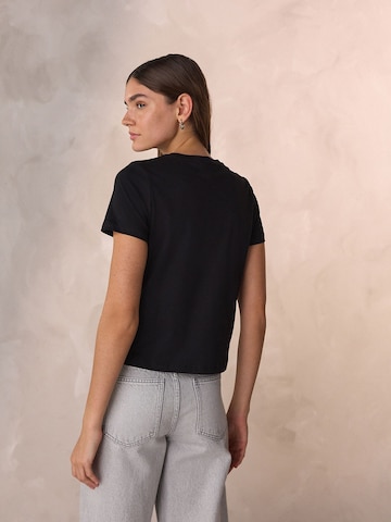 Next T-shirt i svart