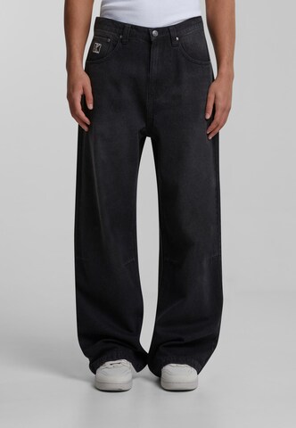 regular Jeans di Karl Kani in grigio