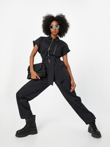 Tuta jumpsuit 'Utility' di Warehouse in nero