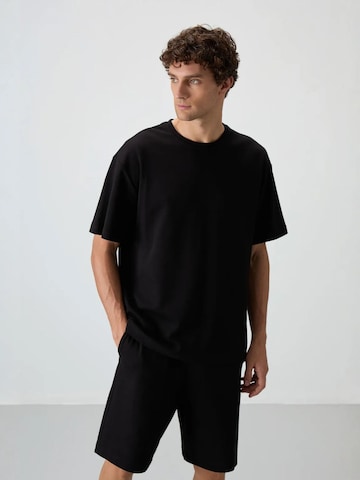 Regular Pantalon Tommy Life en noir