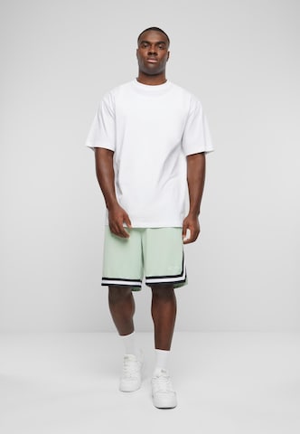 Karl Kani Loose fit Pants in Green