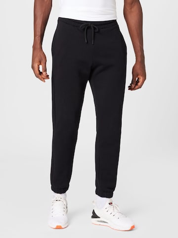 UNITED COLORS OF BENETTON Tapered Trousers in Black: front