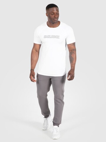 T-Shirt fonctionnel 'Timmy' Smilodox en blanc
