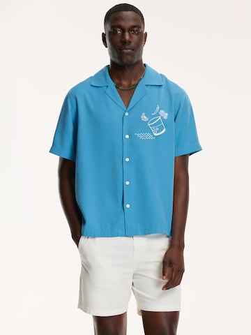 Coupe regular Chemise Shiwi en bleu : devant