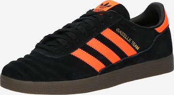 Adidas gazelle noir orange online