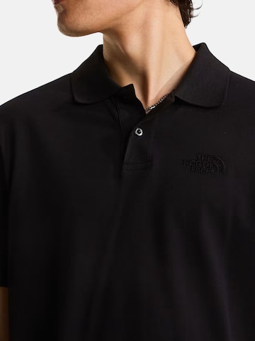 THE NORTH FACE - Camiseta 'THE NORTH FACE M ESS RG POLO TEE POLO' en negro