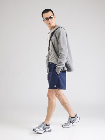 Nike Sportswear Loosefit Bukser 'CLUB' i blå