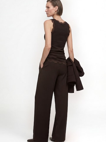 Top de la Rich & Royal pe maro