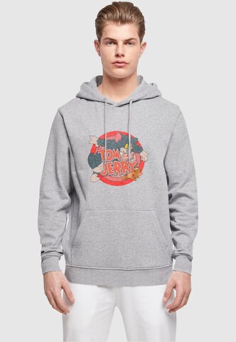 ABSOLUTE CULT Sweatshirt 'Tom And Jerry - Classic Catch' in Grijs: voorkant