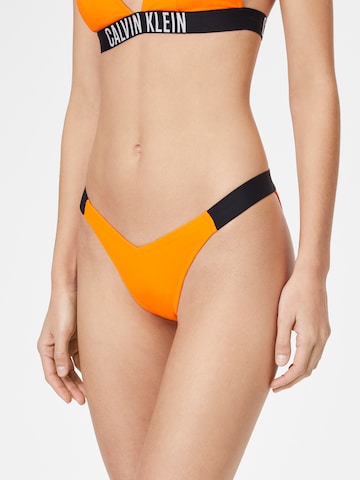 Calvin Klein Swimwear Regular Bikini Bottoms in Orange: front