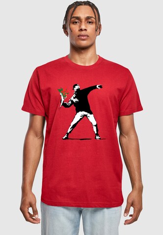 Maglietta 'Banksy - Love Is In The Air' di Merchcode in rosso: frontale
