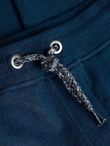 Next Дънки Tapered Leg Панталон в синьо