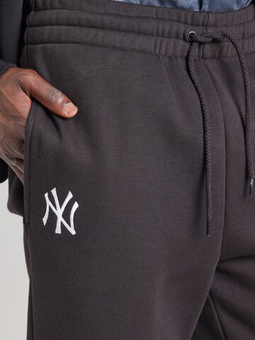 NEW ERA Конический (Tapered) Штаны 'NEYYAN' в Черный