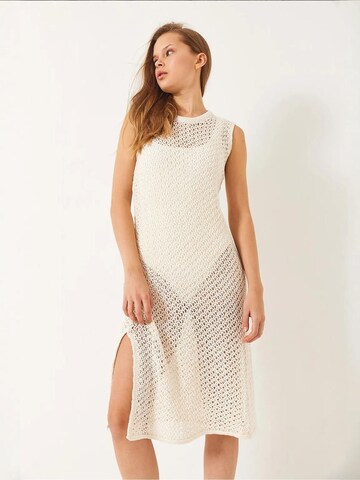 Bianco Lucci Beach Dress in Beige: front
