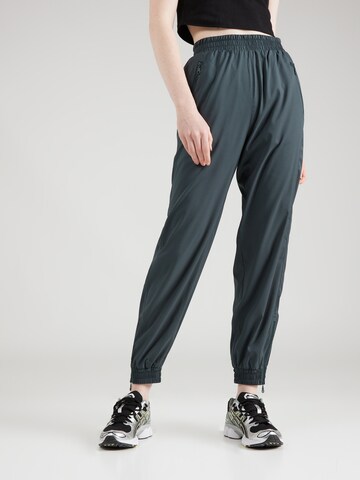 Effilé Pantalon de sport 'Summit Track' Girlfriend Collective en vert : devant