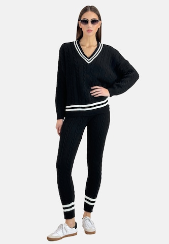 Elara Huispak in Zwart: voorkant