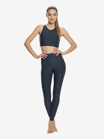 Winshape Skinny Urheiluhousut 'HWL117C' värissä harmaa